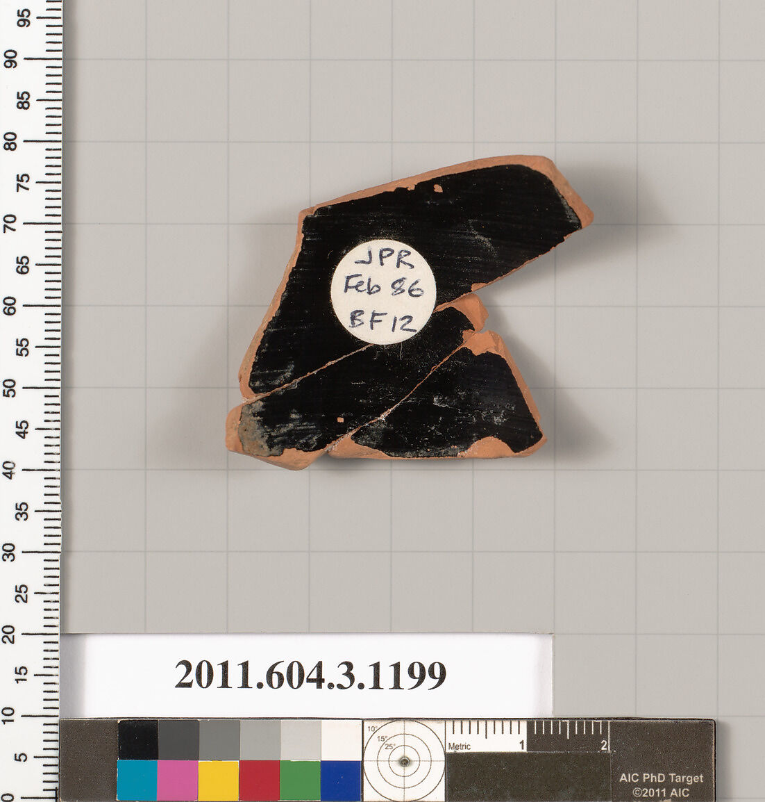 Terracotta fragment of a mastoid (drinking cup with narrow base), Terracotta, Greek, Attic