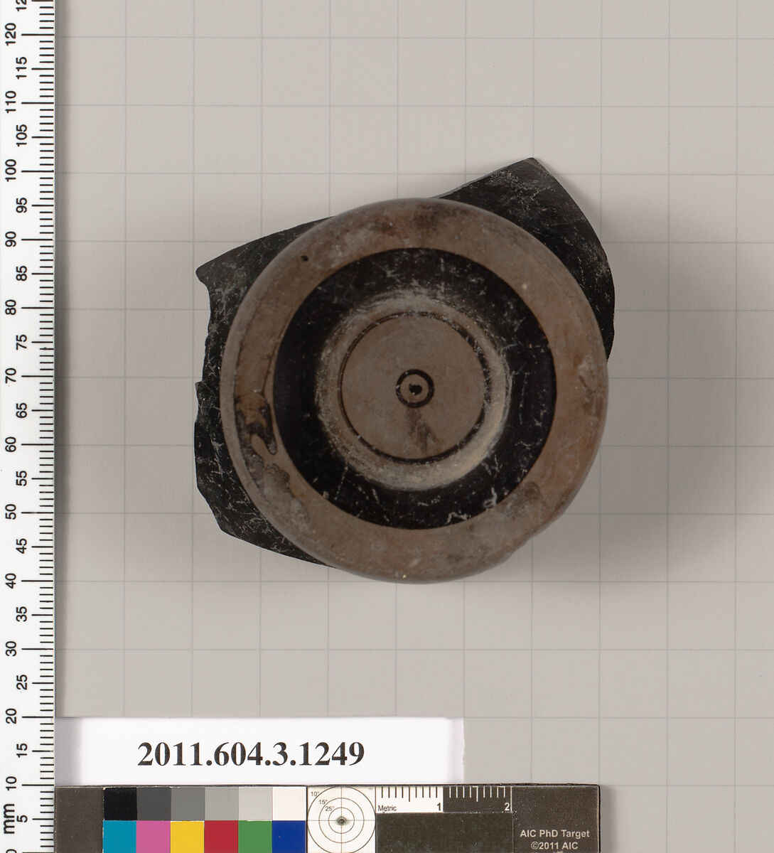 Terracotta fragment of a kyathos (cup-shaped ladle), Terracotta, Greek, Attic