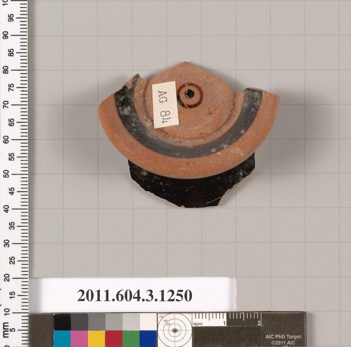 Terracotta fragment of a kyathos (cup-shaped ladle), Terracotta, Greek, Attic