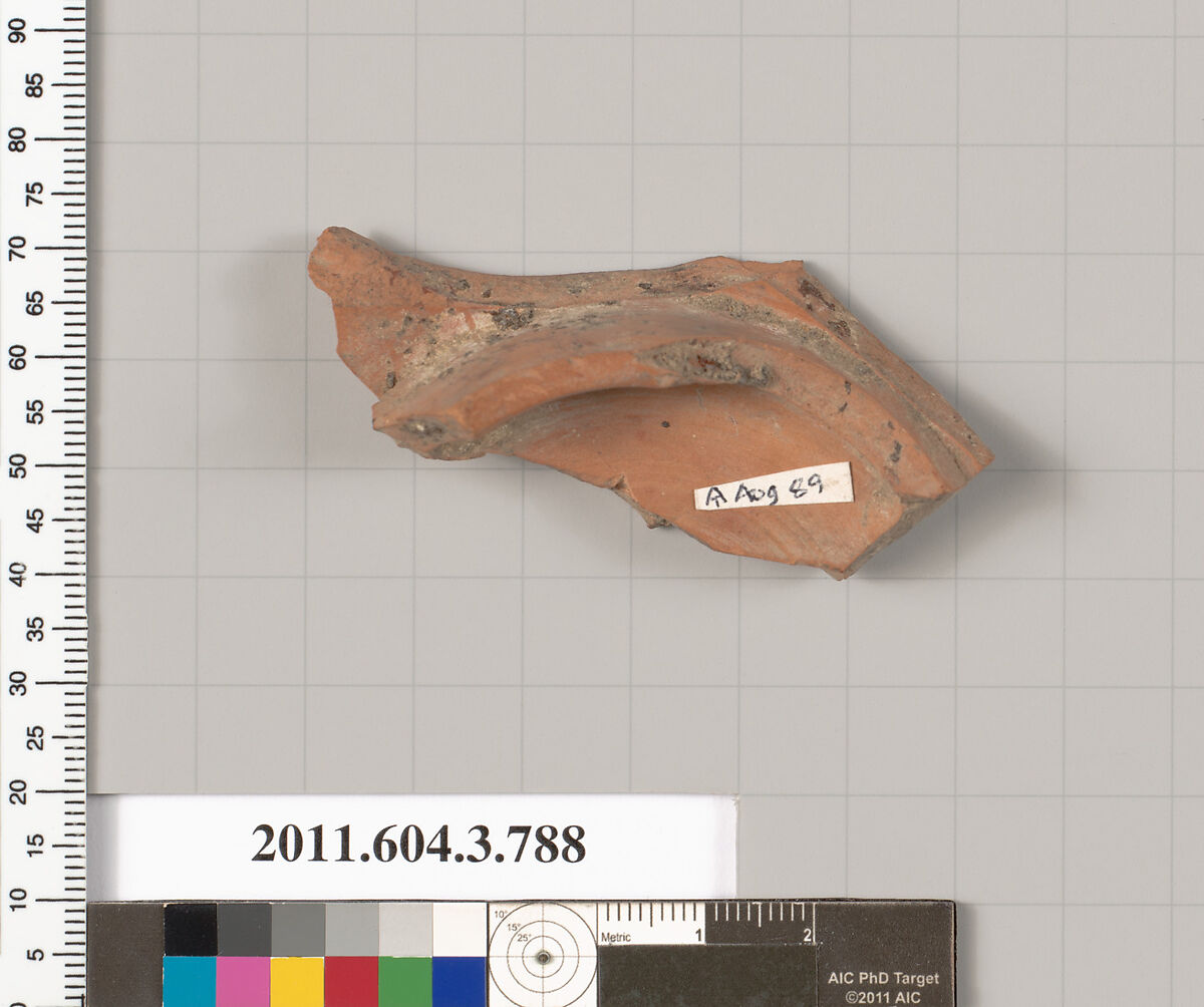Terracotta fragment of a lid, Terracotta, Greek, Attic