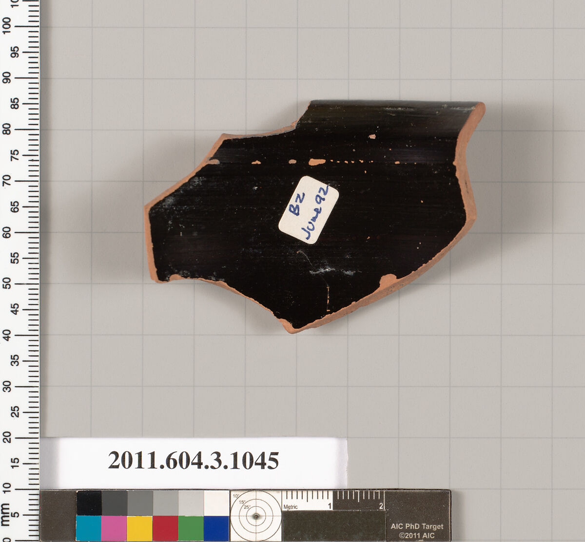 Terracotta fragment of a mastoid (drinking cup with narrow base), Terracotta, Greek, Attic