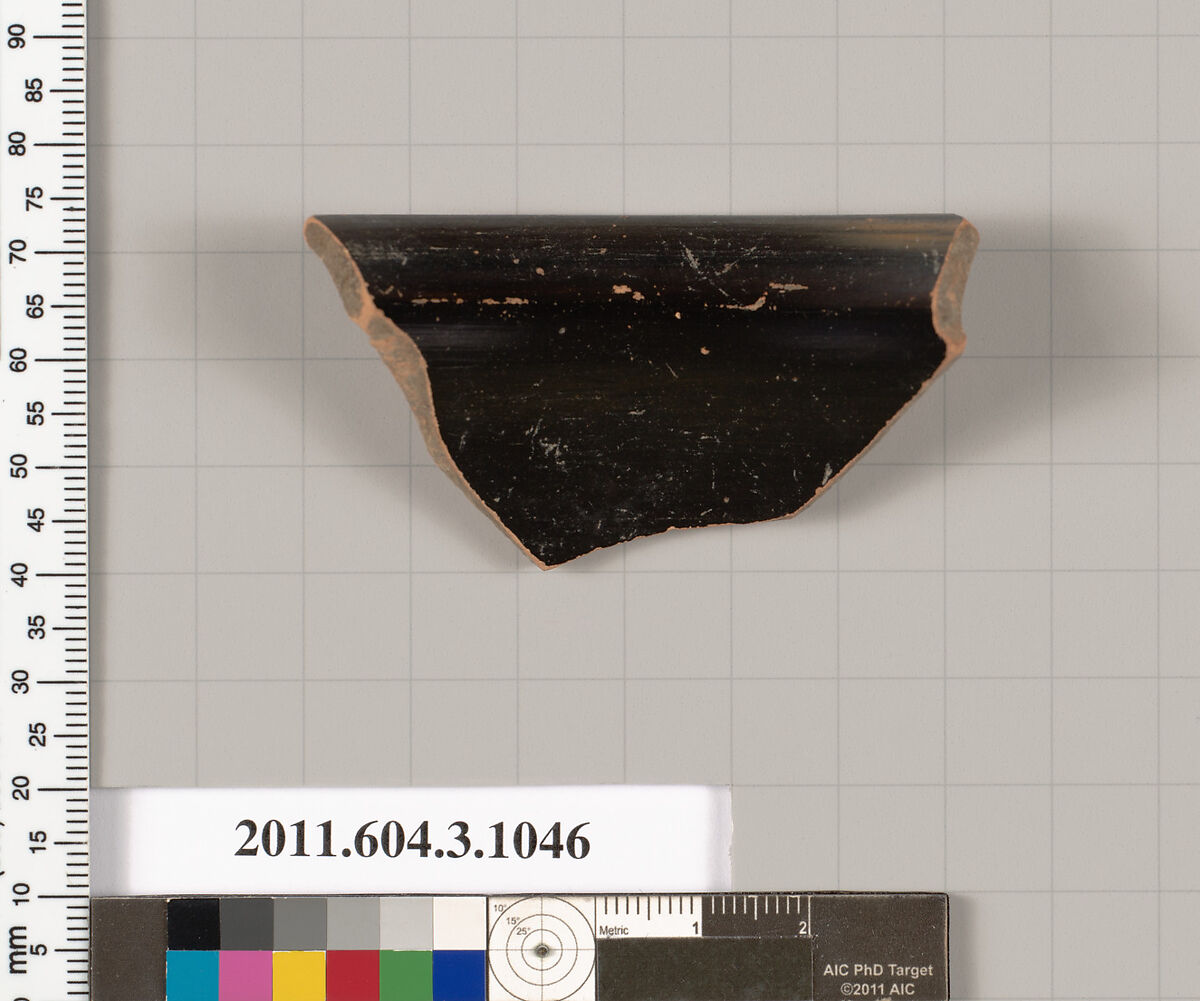 Terracotta fragment of a mastoid (drinking cup with narrow base), Terracotta, Greek, Attic