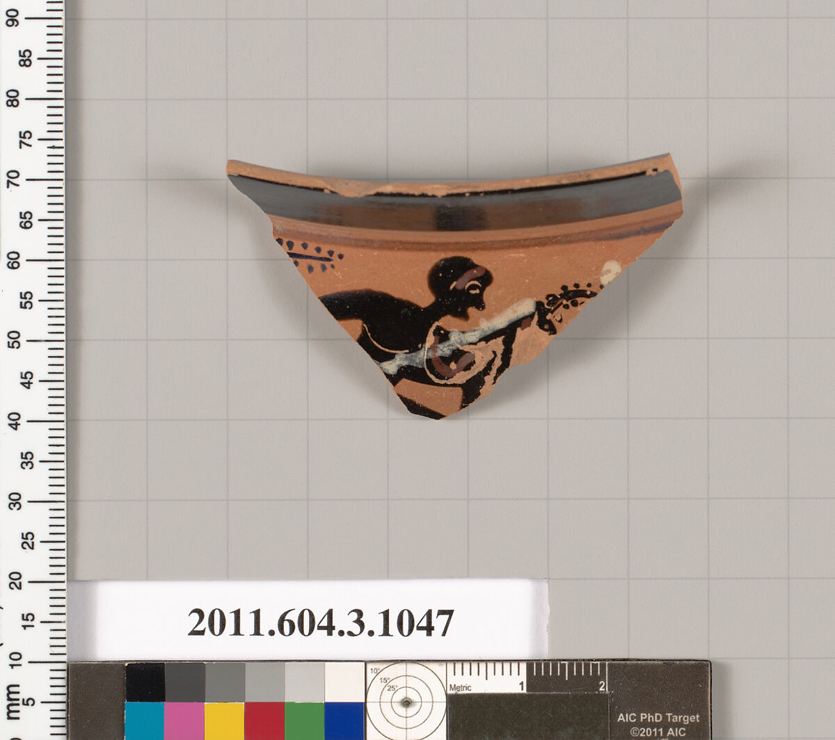 Terracotta fragment of a mastoid (drinking cup with narrow base), Terracotta, Greek, Attic 