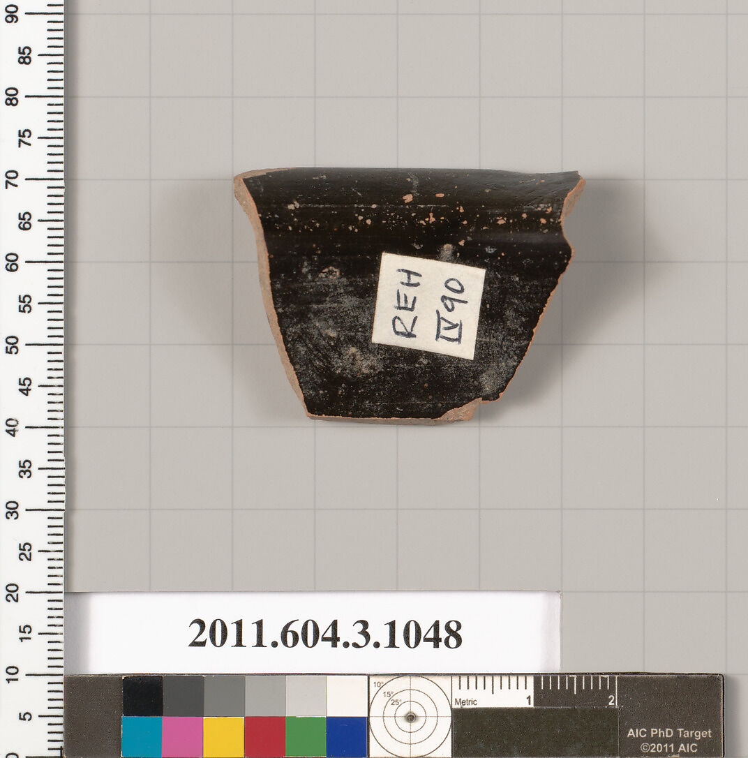 Terracotta fragment of a mastoid (drinking cup with narrow base), Terracotta, Greek, Attic