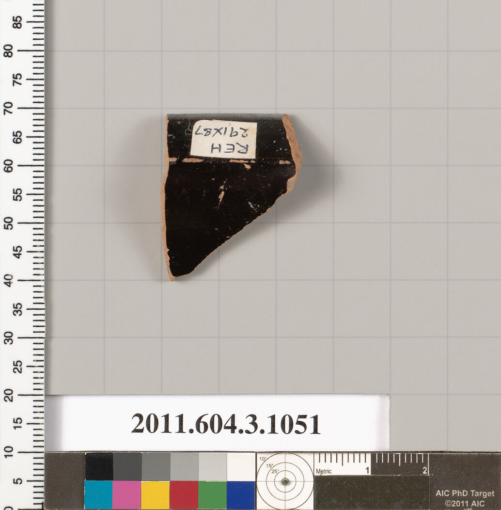 Terracotta fragment of a mastoid (drinking cup with narrow base), Terracotta, Greek, Attic