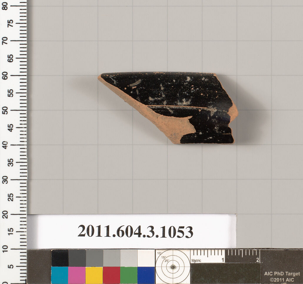 Terracotta fragment of a mastoid (drinking cup with narrow base), Terracotta, Greek, Attic