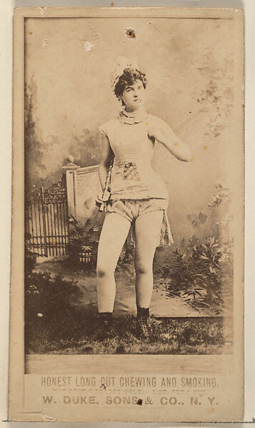 [Actress with fence in background], from the Actresses, Celebrities, and Children series (N151) issued by Duke Sons & Co. to promote Duke Cigarettes, Issued by W. Duke, Sons &amp; Co. (New York and Durham, N.C.), Albumen photograph 