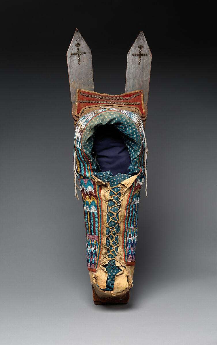 Cradleboard, Tanned leather, rawhide, wood, pigment, glass beads, wool cloth, cotton cloth, brass tacks, and brass link chain, Kiowa, Native American