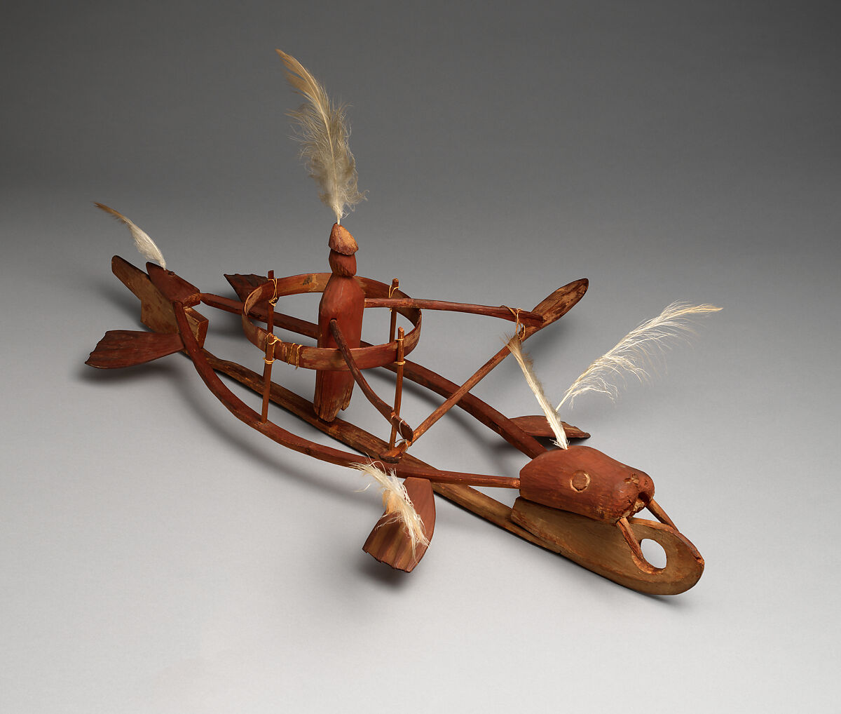 Dance object, Wood, pigment, vegetal fiber, and feathers, Yup'ik, Native American 