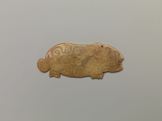 Plaque in the shape of an animal