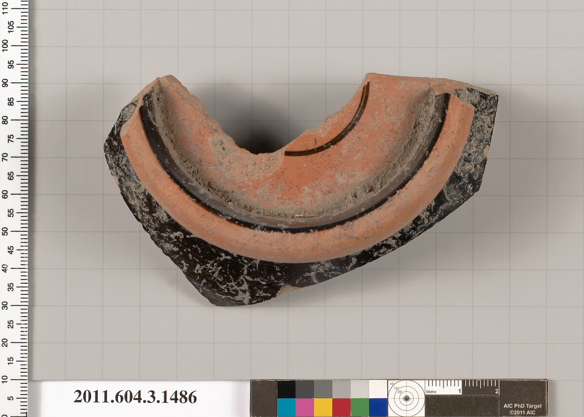 Terracotta fragment of a skyphos (deep drinking cup), Terracotta, Greek, Attic 