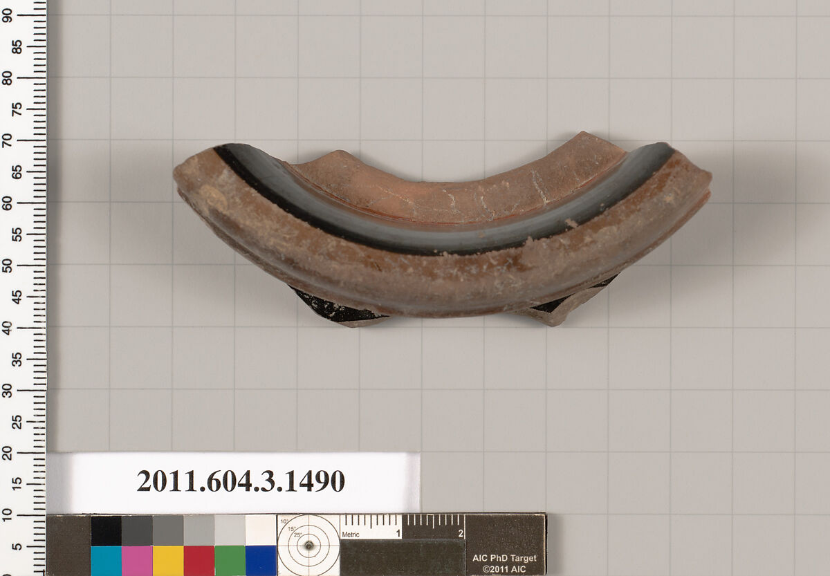 Terracotta fragment of a skyphos (deep drinking cup), Terracotta, Greek, Attic