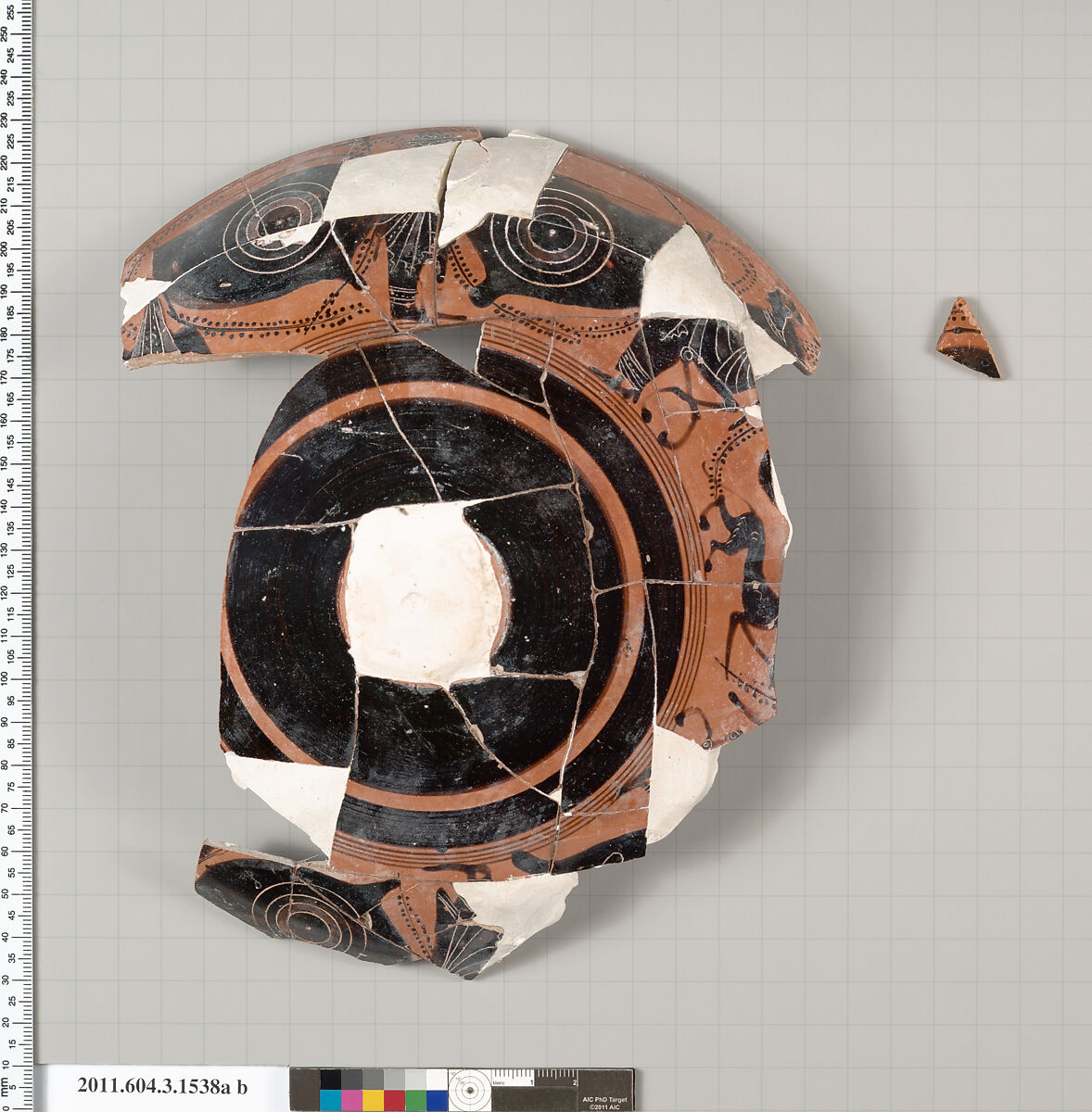 Terracotta fragments of a kylix: eye-cup (drinking cup), Terracotta, Greek, Attic