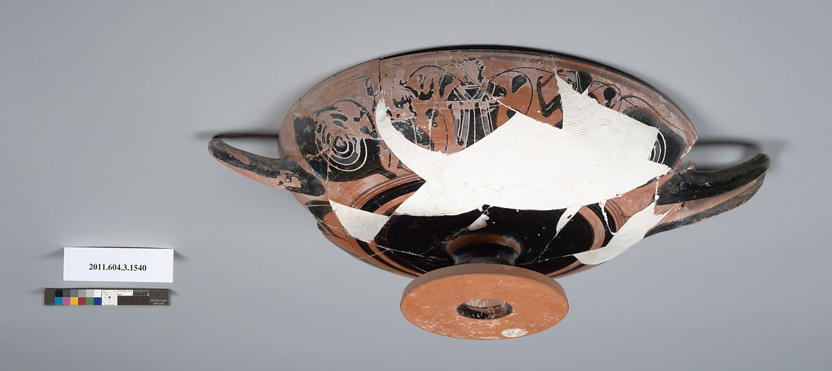 Terracotta fragment of a kylix: eye-cup (drinking cup), Terracotta, Greek, Attic