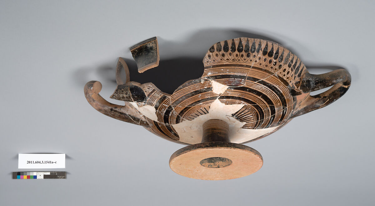 Terracotta fragments of a kylix: Droop cup (drinking cup), Terracotta, Greek, Attic
