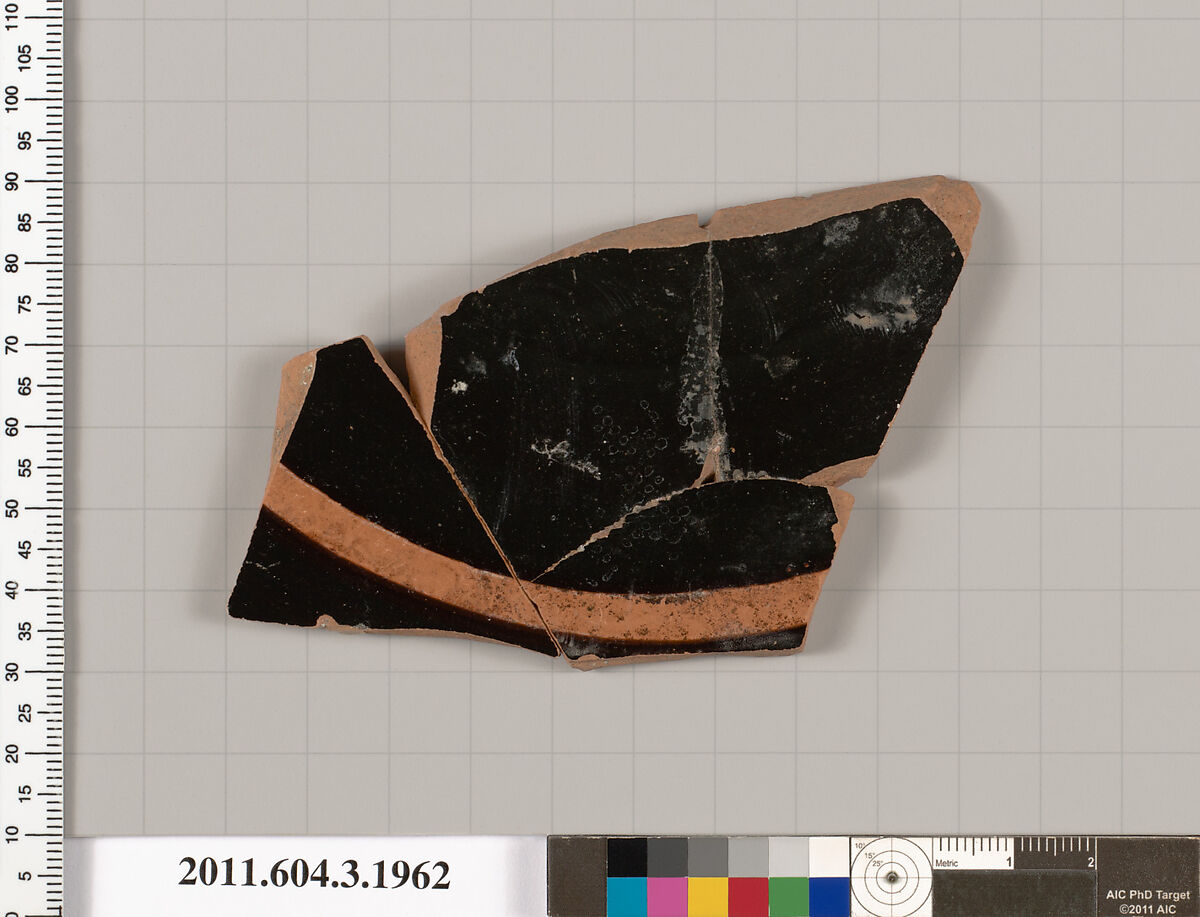Terracotta fragment of a kylix (drinking cup), Terracotta, Greek, Attic