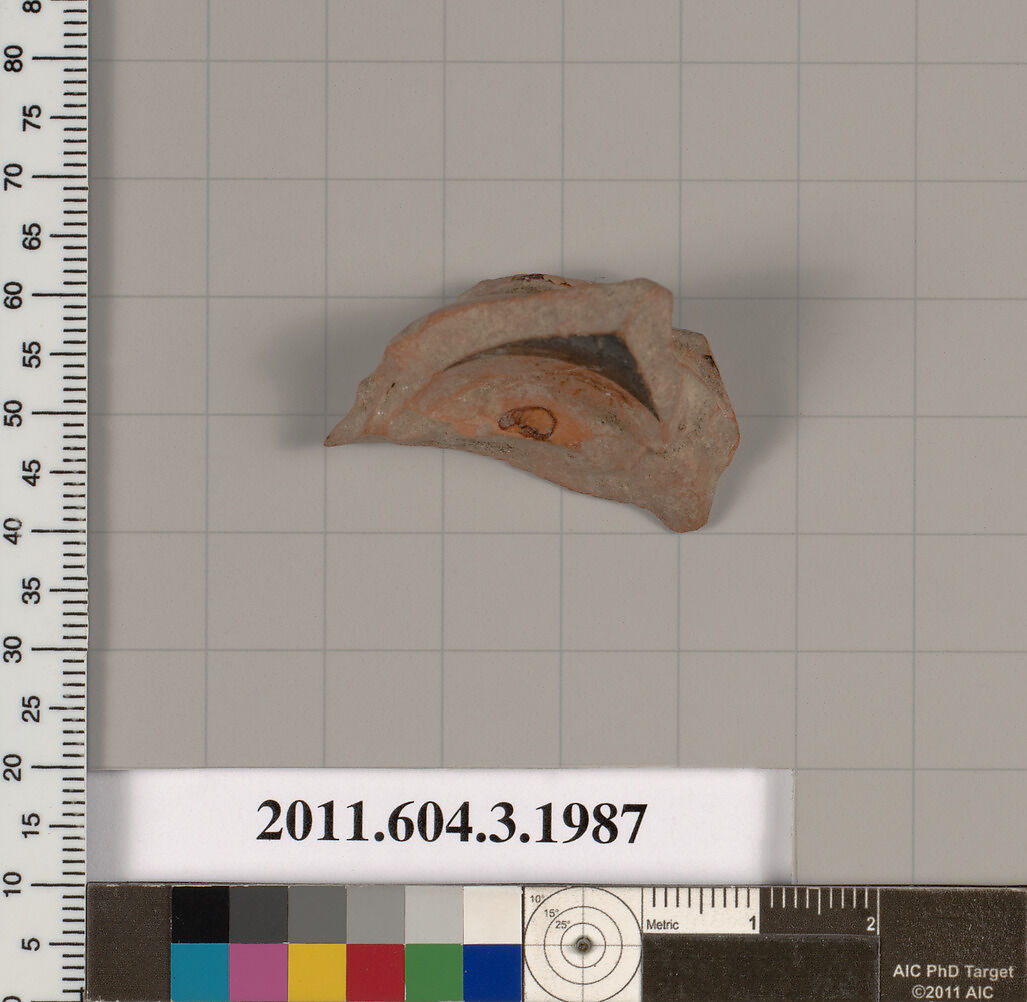 Terracotta fragment of a stemless cup (drinking cup), Terracotta, Greek, Attic