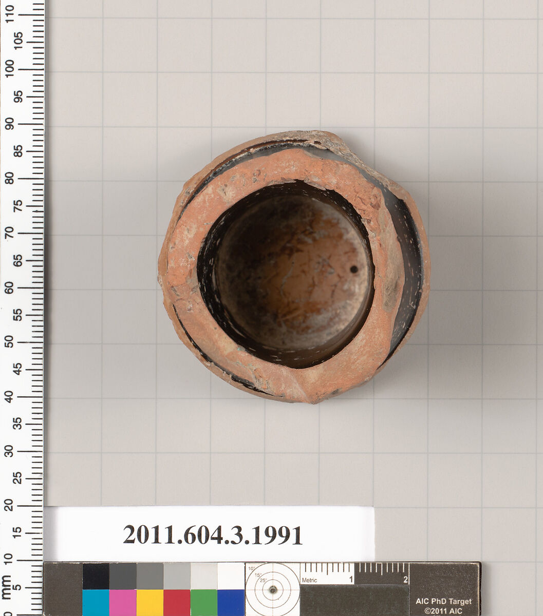 Terracotta fragment of a kylix (drinking cup), Terracotta, Greek, Attic