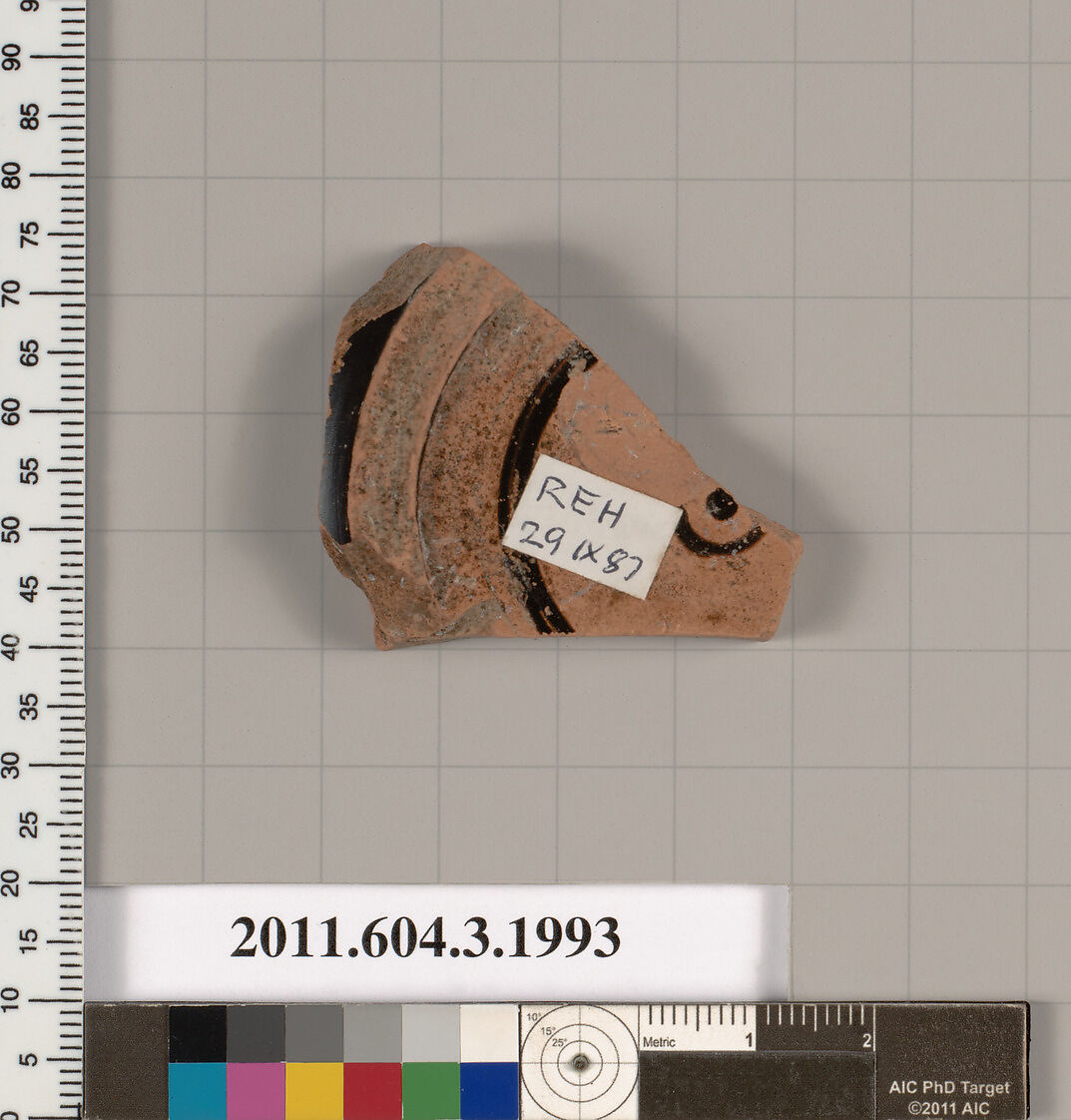 Terracotta fragment of a stemless cup (drinking cup), Terracotta, Greek, Attic