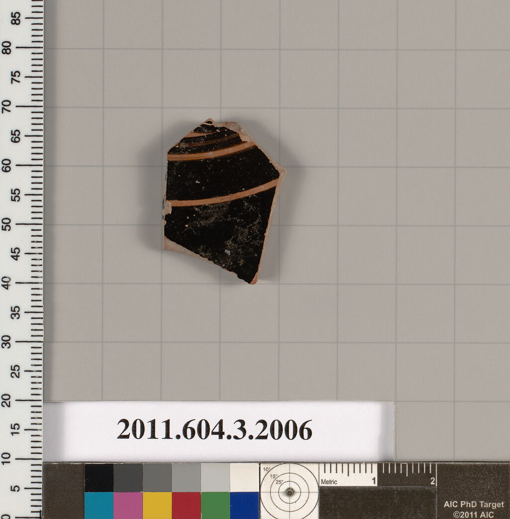 Terracotta fragment of a kylix (drinking cup), Terracotta, Greek, Attic 