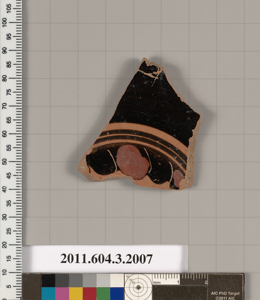 Terracotta fragment of a kylix (drinking cup), Terracotta, Greek, Attic 