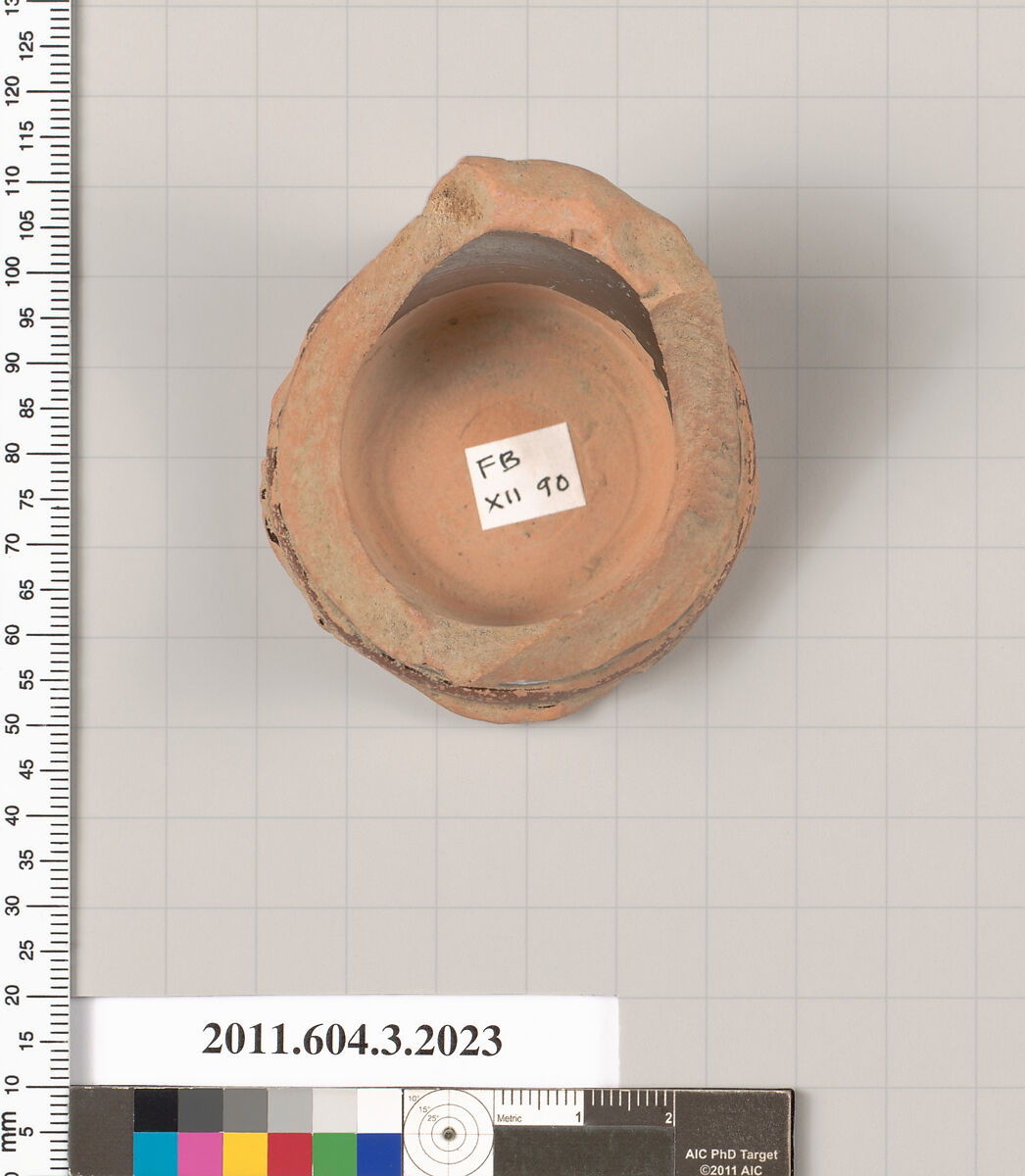 Terracotta fragment of a kylix (drinking cup), Terracotta, Greek, Attic