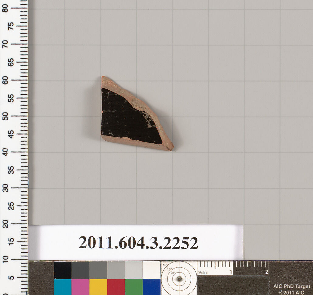 Terracotta fragment of a kylix (drinking cup), Terracotta, Greek, Attic