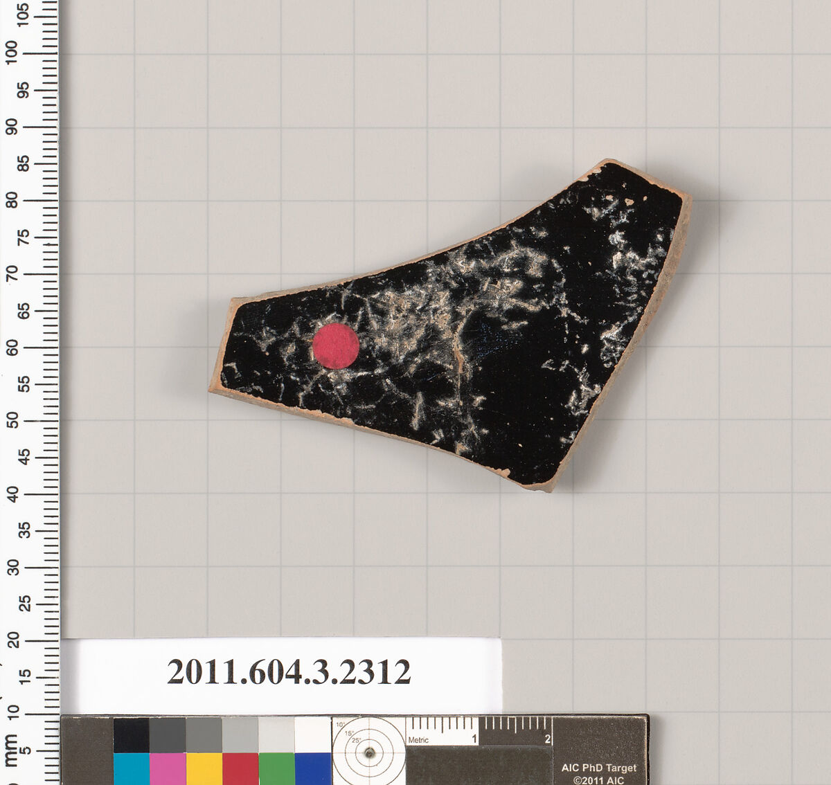 Terracotta fragment of a kylix: eye-cup (drinking cup), Terracotta, Greek, Attic
