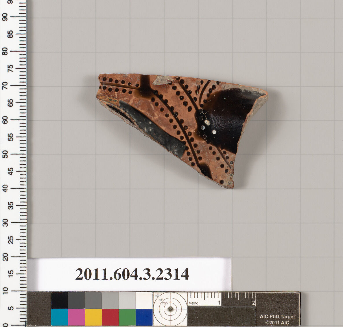Terracotta fragment of a kylix: eye-cup (drinking cup), Terracotta, Greek, Attic