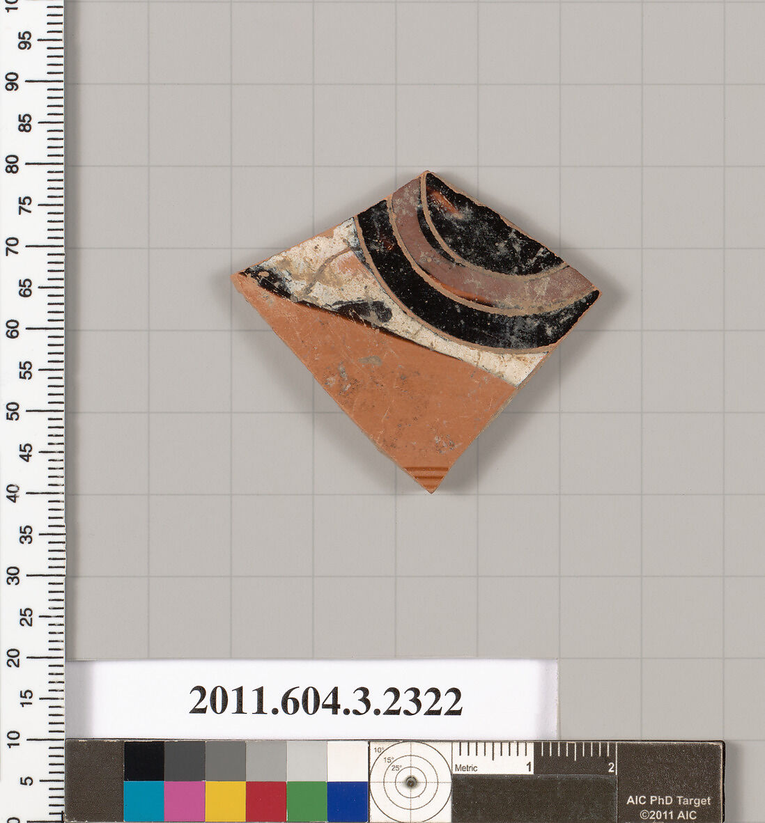 Terracotta fragment of a kylix: eye-cup (drinking cup), Terracotta, Greek, Attic 
