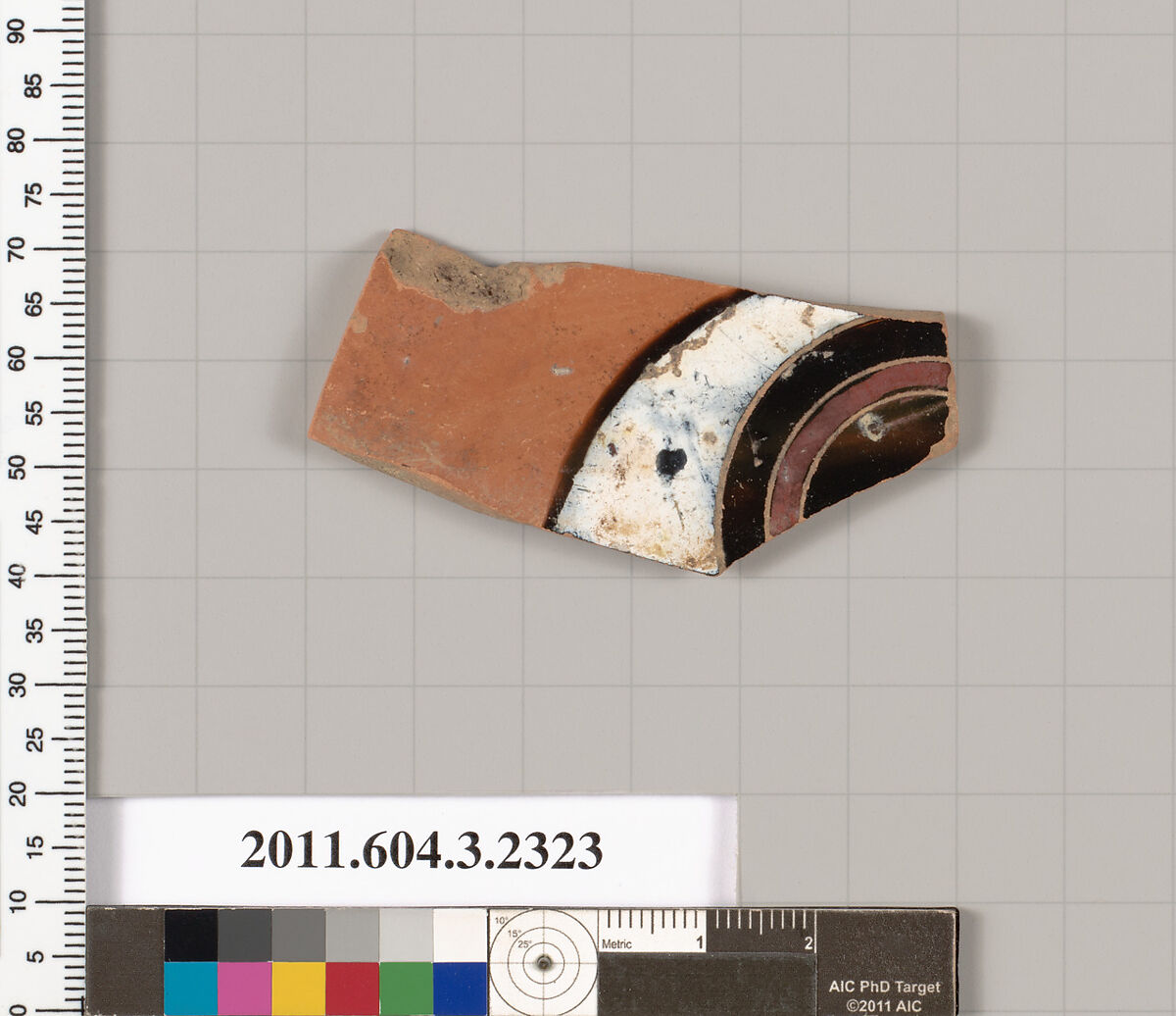 Terracotta fragment of a kylix: eye-cup (drinking cup), Terracotta, Greek, Attic 