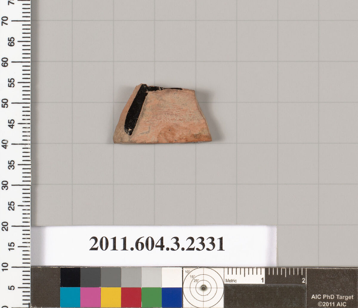 Terracotta fragment of a kylix: eye-cup (drinking cup), Terracotta, Greek, Attic
