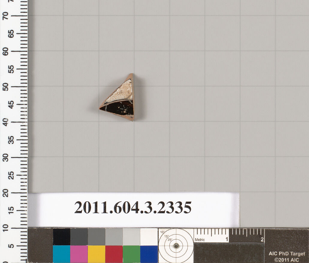 Terracotta fragment of a kylix: eye-cup (drinking cup), Terracotta, Greek, Attic