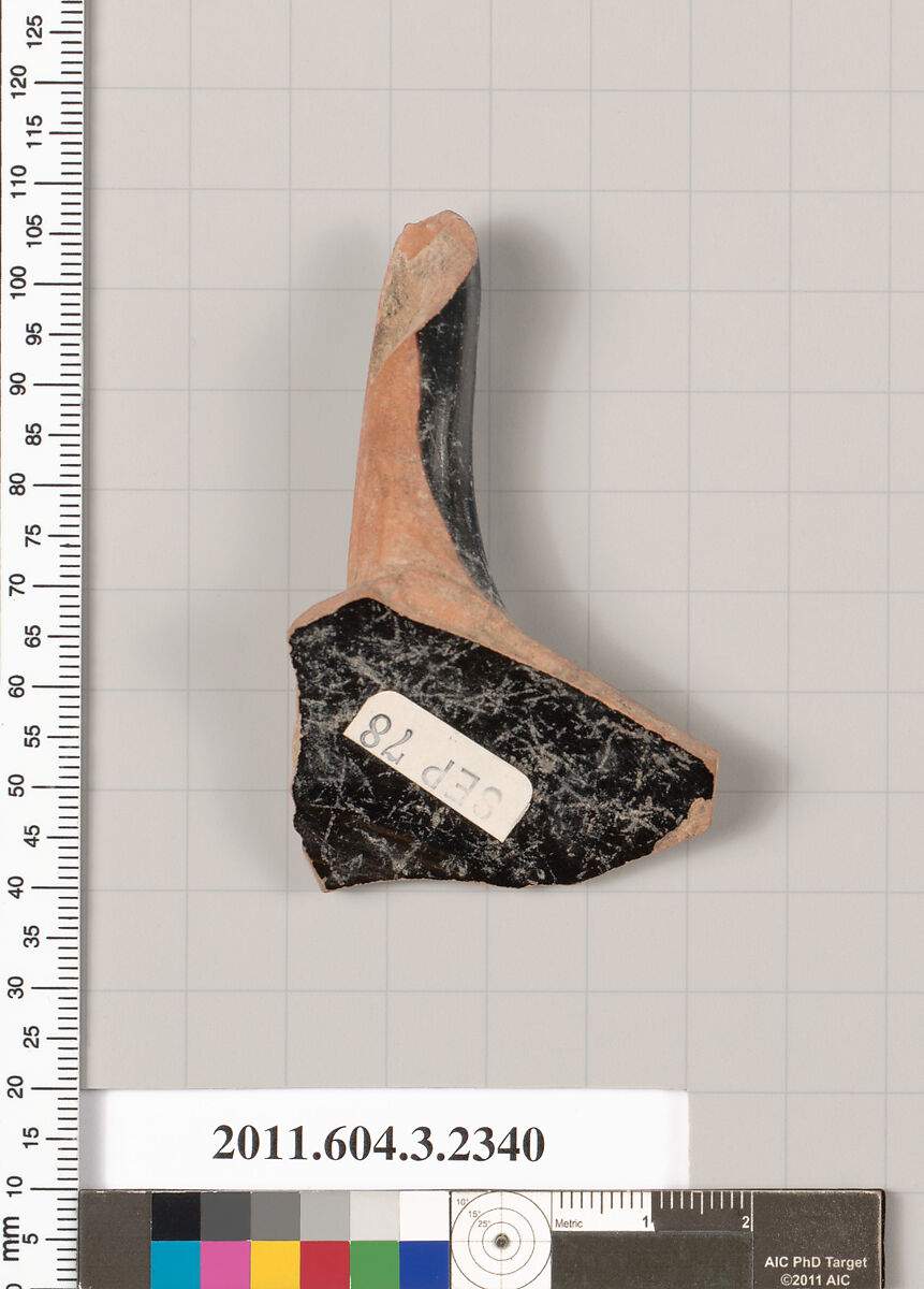 Terracotta fragment of a kylix: eye-cup (drinking cup), Terracotta, Greek, Attic