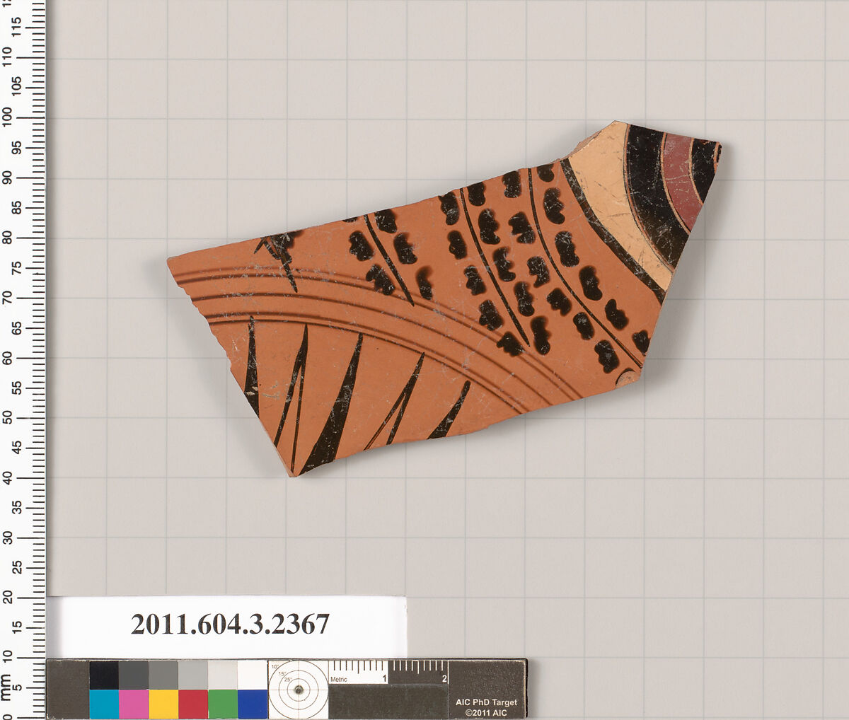 Terracotta fragment of a kylix: eye-cup (drinking cup), Terracotta, Greek, Attic 