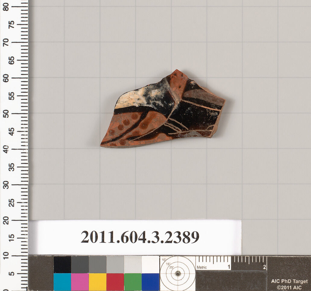 Terracotta fragment of a kylix: eye-cup (drinking cup), Terracotta, Greek, Attic 
