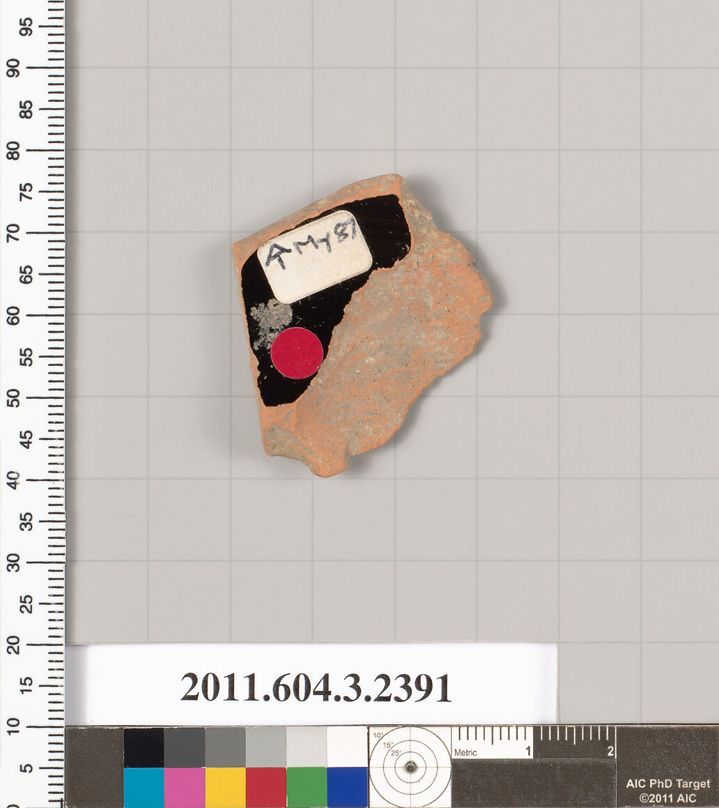 Terracotta fragment of a kylix: eye-cup (drinking cup), Terracotta, Greek, Attic