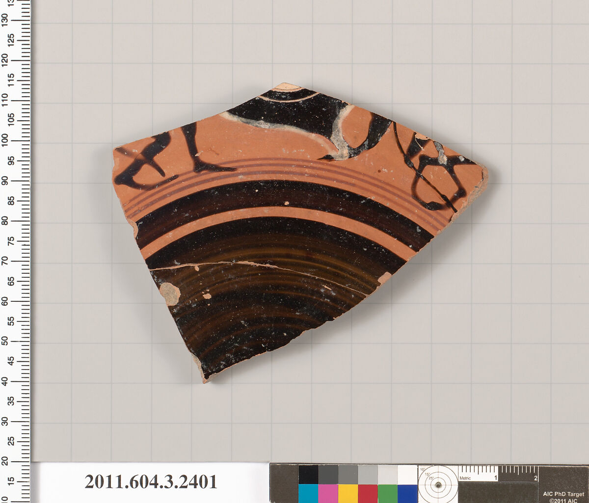 Terracotta fragment of a kylix: eye-cup (drinking cup), Terracotta, Greek, Attic