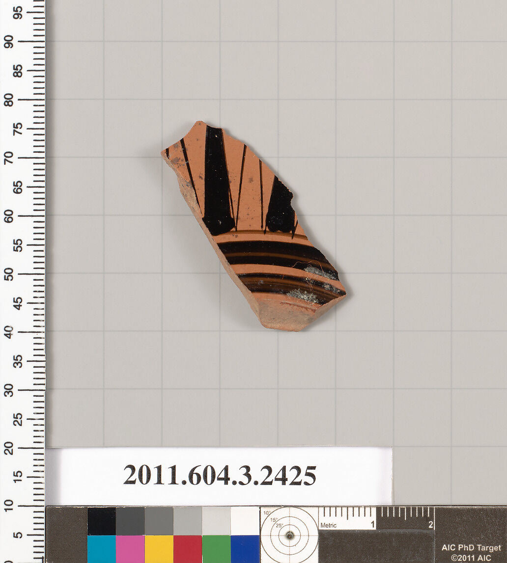 Terracotta fragment of a kylix: eye-cup (drinking cup), Terracotta, Greek, Attic
