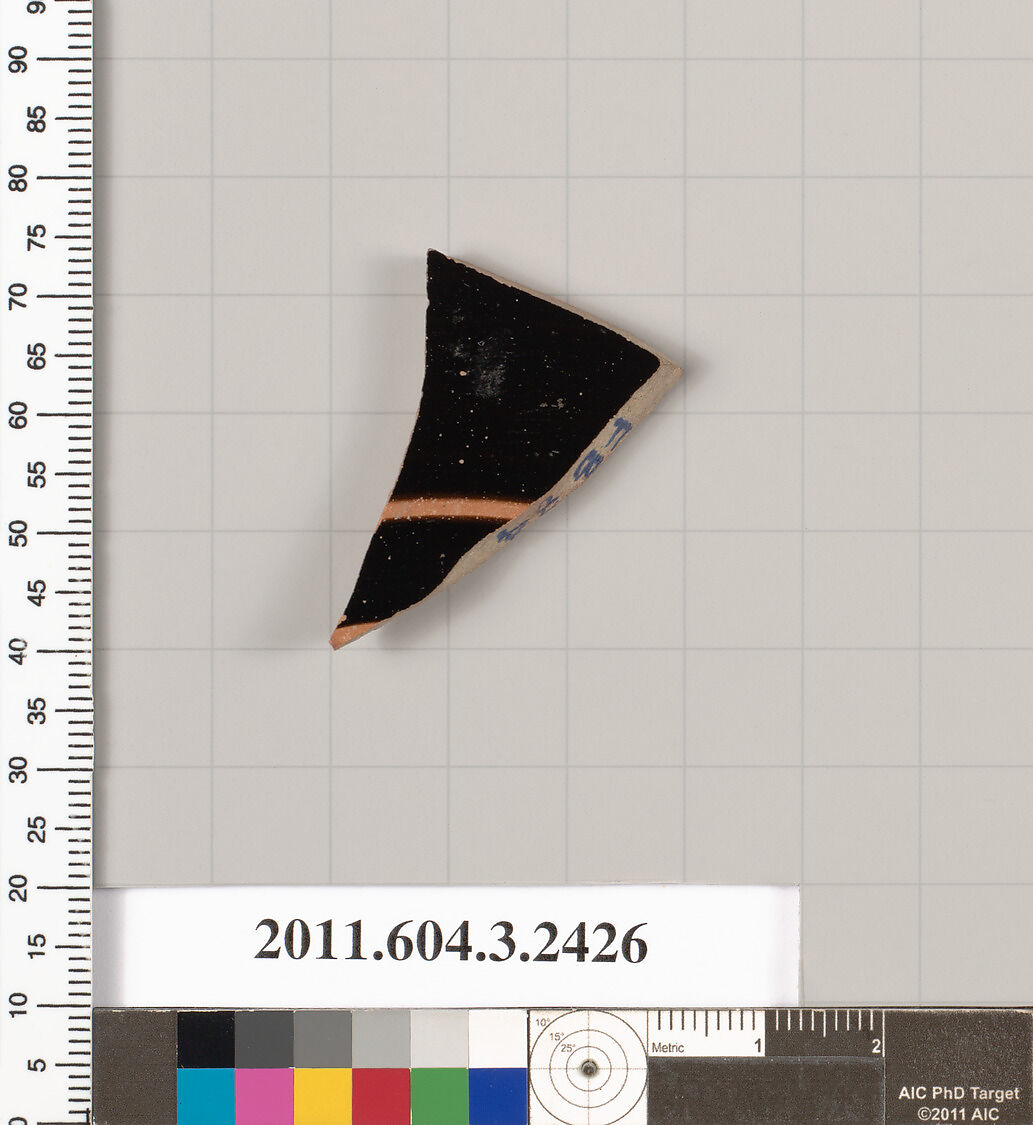 Terracotta fragment of a kylix: eye-cup (drinking cup), Terracotta, Greek, Attic