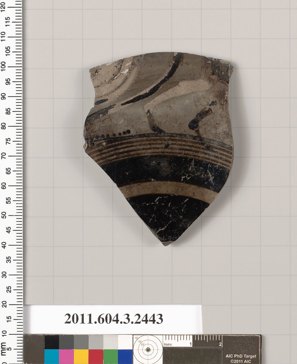 Terracotta fragment of a kylix: eye-cup (drinking cup), Terracotta, Greek, Attic
