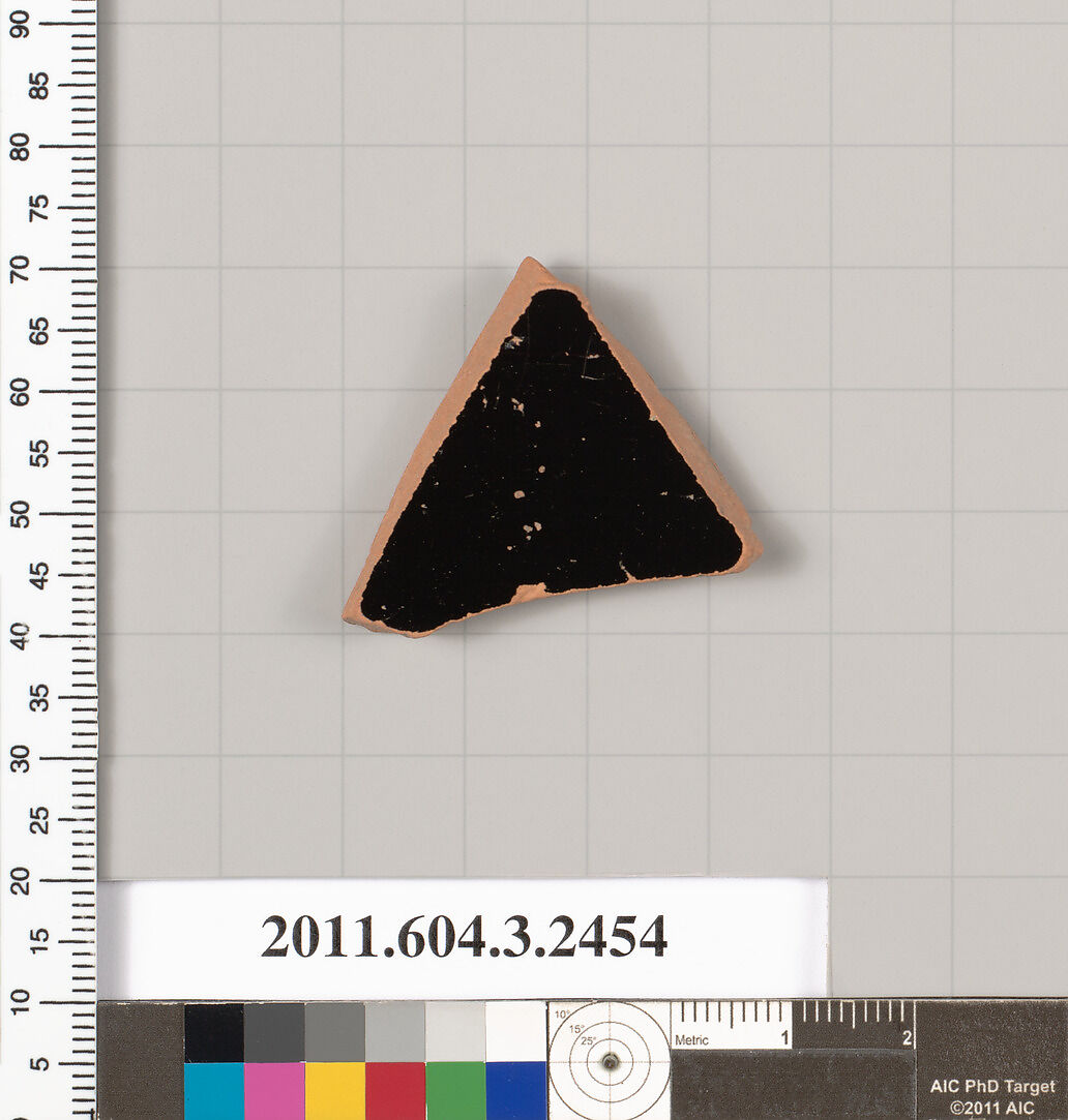 Terracotta fragment of a kylix: eye-cup (drinking cup), Terracotta, Greek, Attic