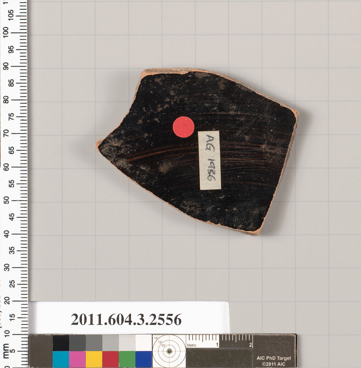 Terracotta fragment of a kylix: eye-cup (drinking cup), Terracotta, Greek, Attic