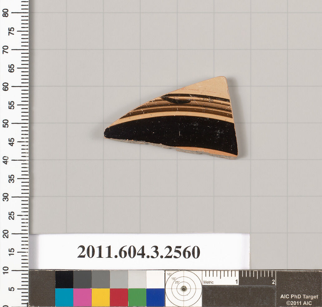 Terracotta fragment of a kylix (drinking cup), Terracotta, Greek, Attic 