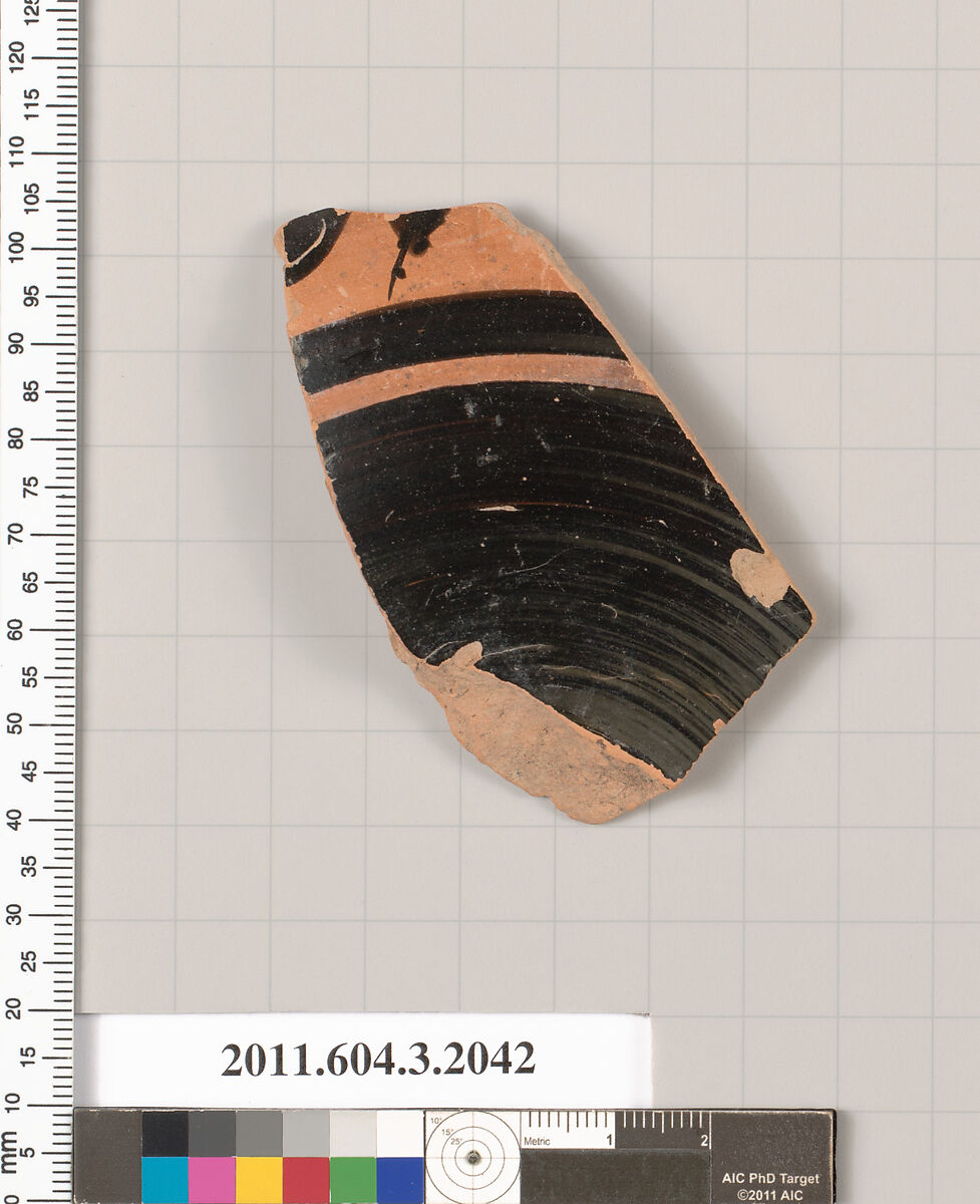 Terracotta fragment of a kylix (drinking cup), Terracotta, Greek, Attic