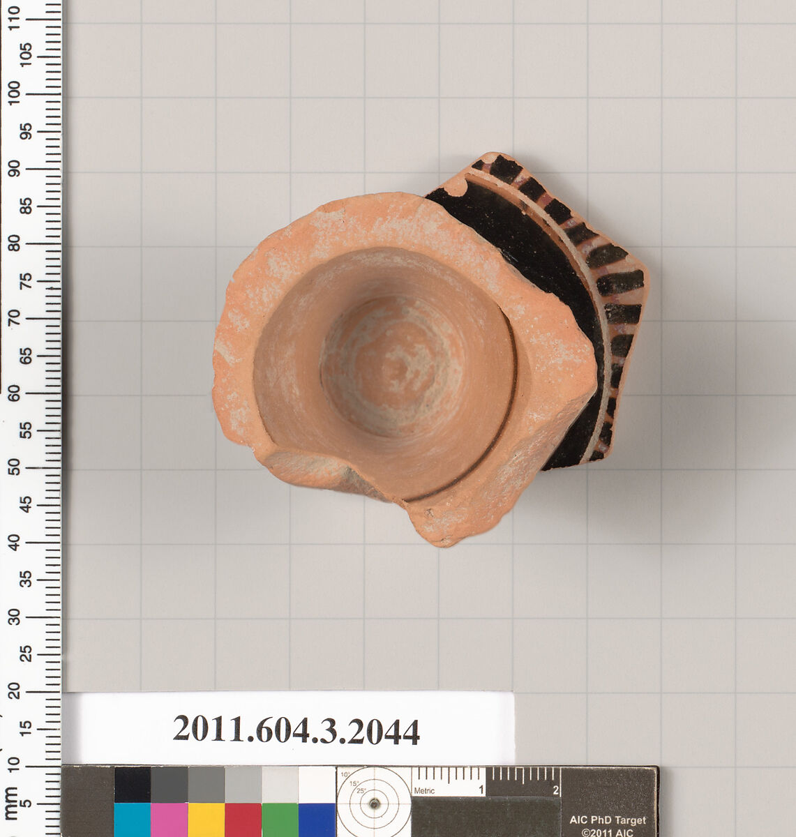 Terracotta fragment of a kylix (drinking cup), Terracotta, Greek, Attic