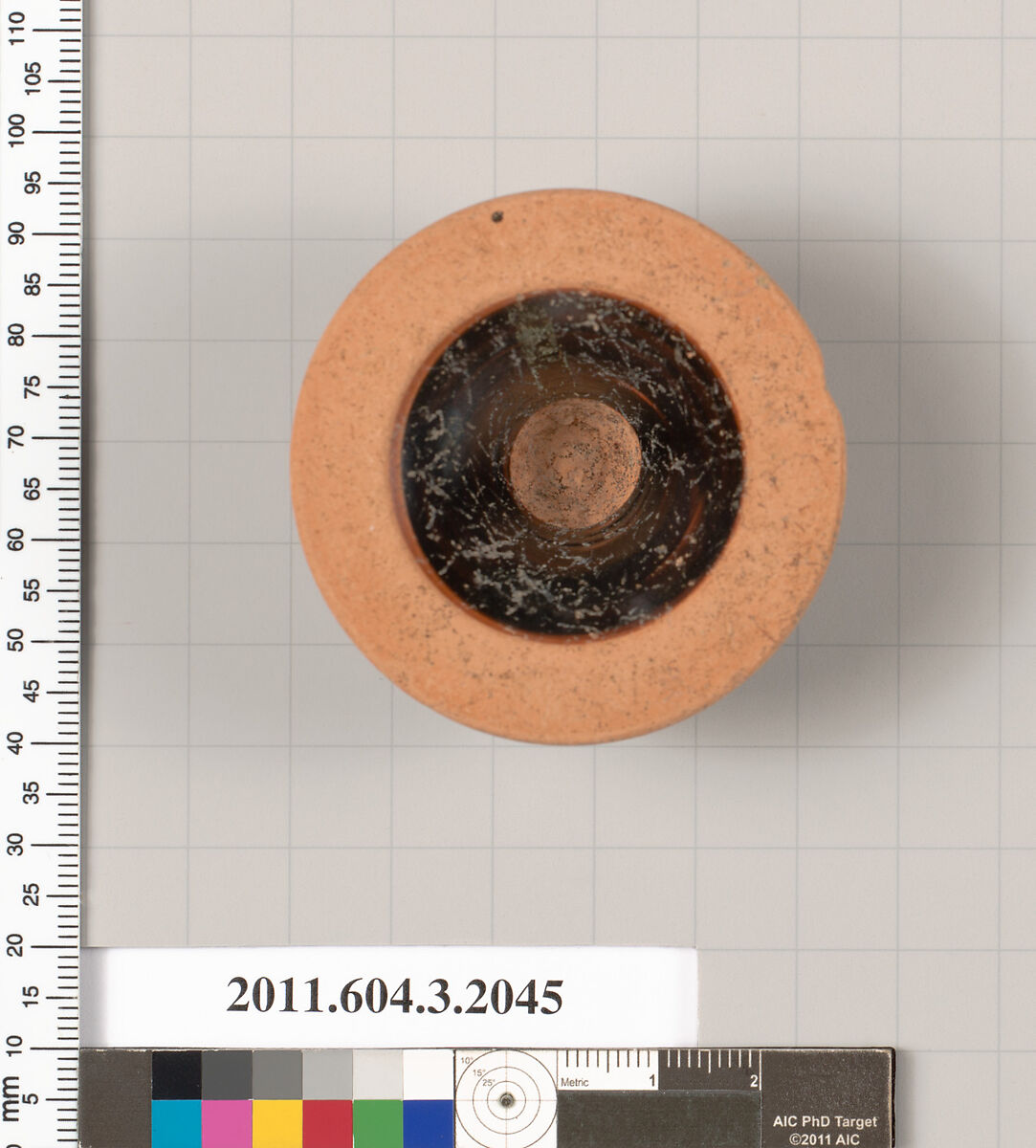 Terracotta fragment of a stemless kylix (drinking cup), Terracotta, Greek, Attic