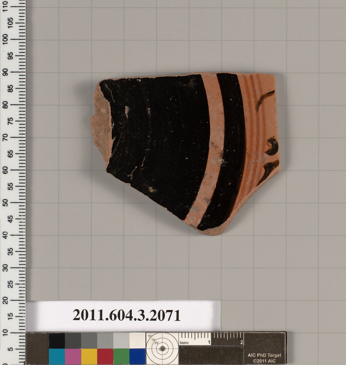 Terracotta fragment of a kylix (drinking cup), Terracotta, Greek, Attic