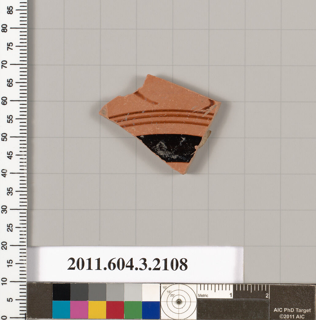 Terracotta fragment of a kylix (drinking cup), Terracotta, Greek, Attic