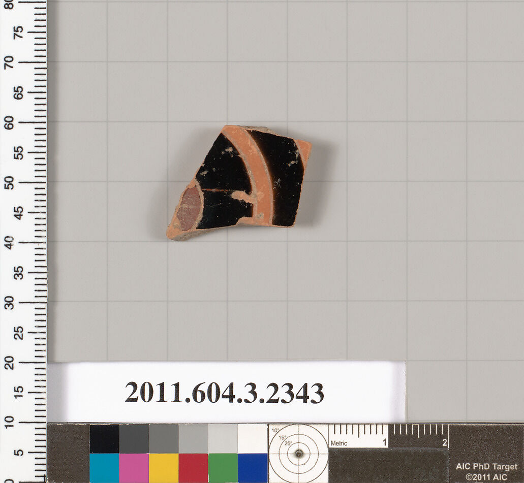 Terracotta fragment of a kylix: eye-cup (drinking cup), Terracotta, Greek, Attic 